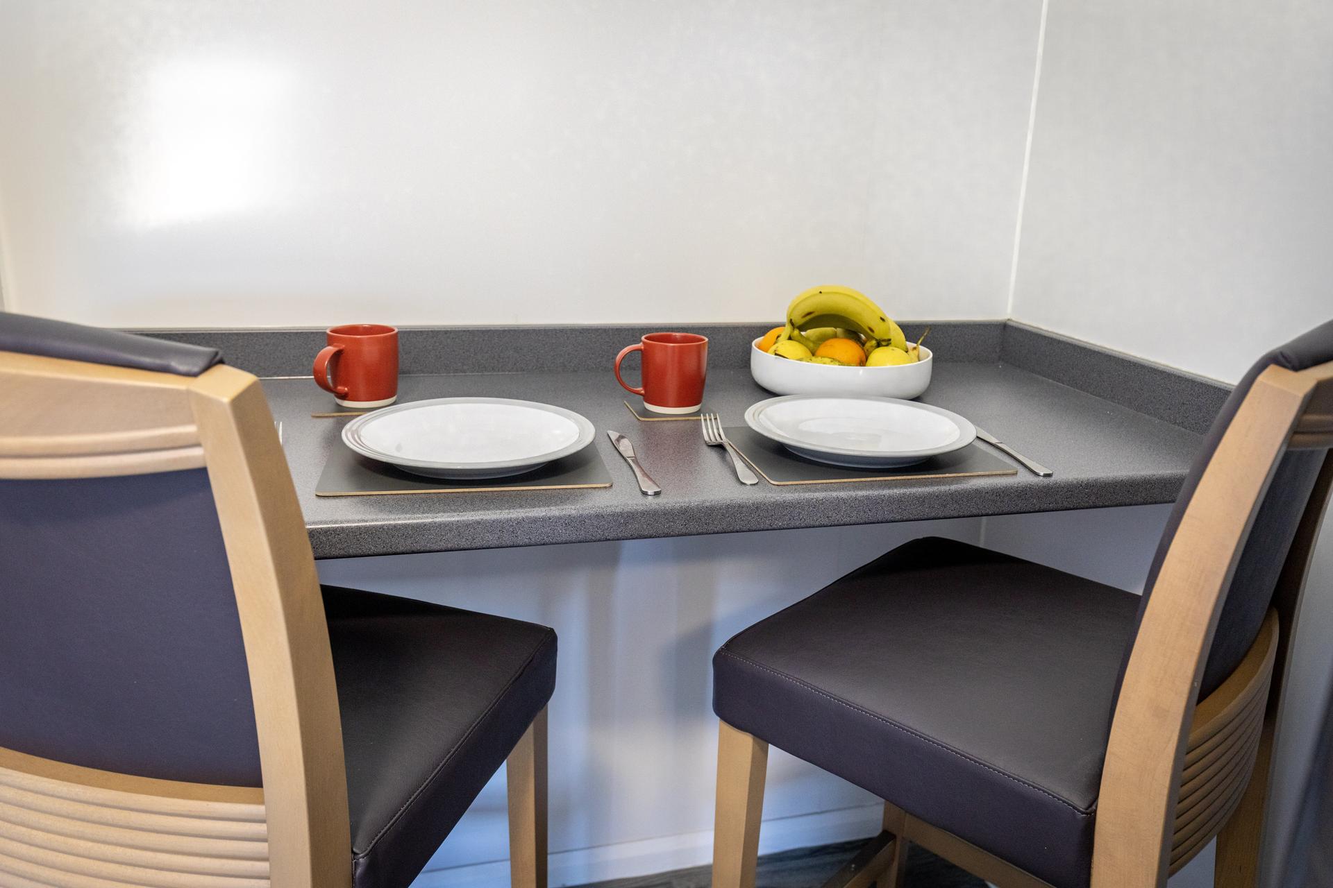 Dinnerware set up for meal time at Aderyn